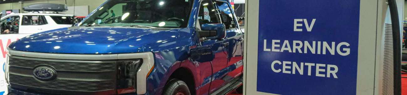 EV Learning Center sign and truck